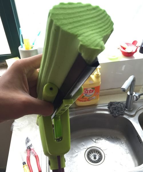 急！妙洁的拖把头怎么替换？？