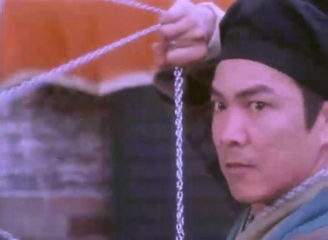 元彪主演的《新碧血剑》的片尾曲是什么?